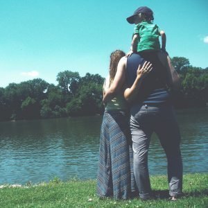 family-together-by-river