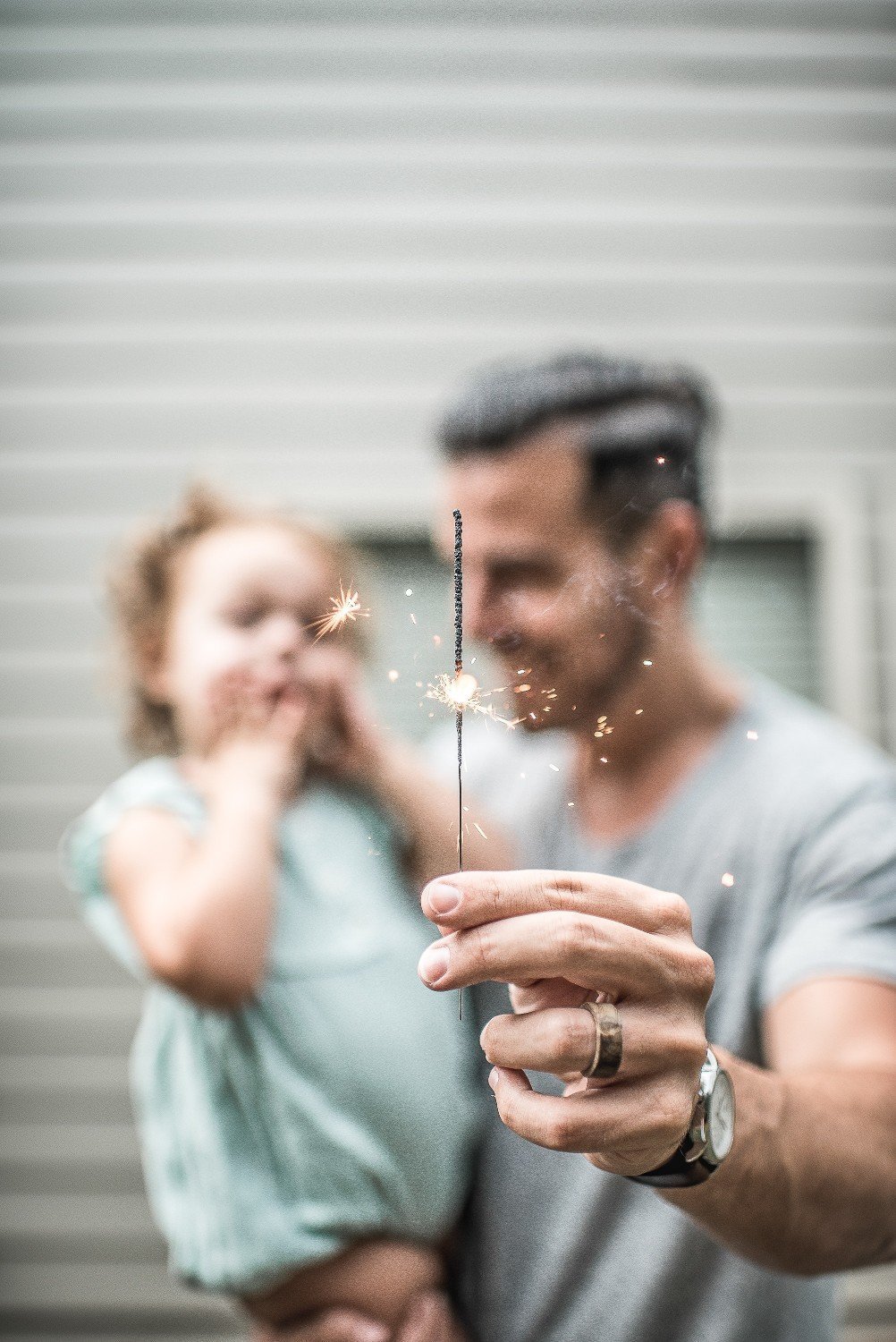 dad-with-girl-and-sparkler