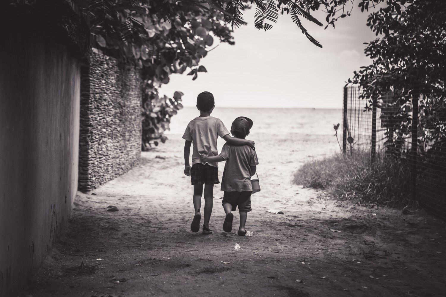 kids-embracing-while-walking