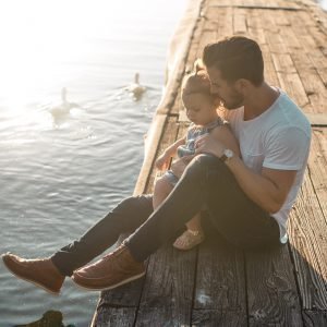 father-with-daughter-on-dock