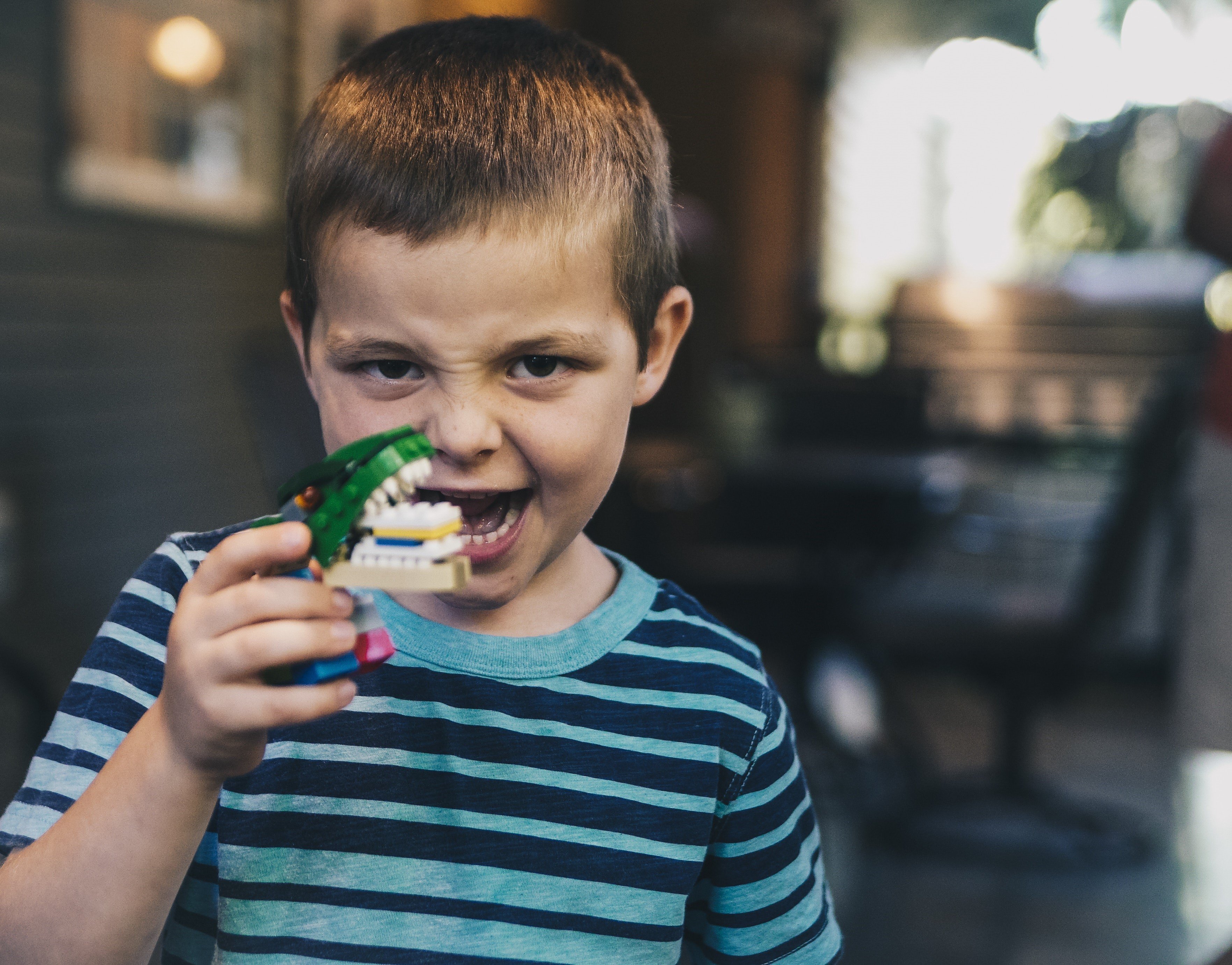 boy-holding-monster-making-funny-face